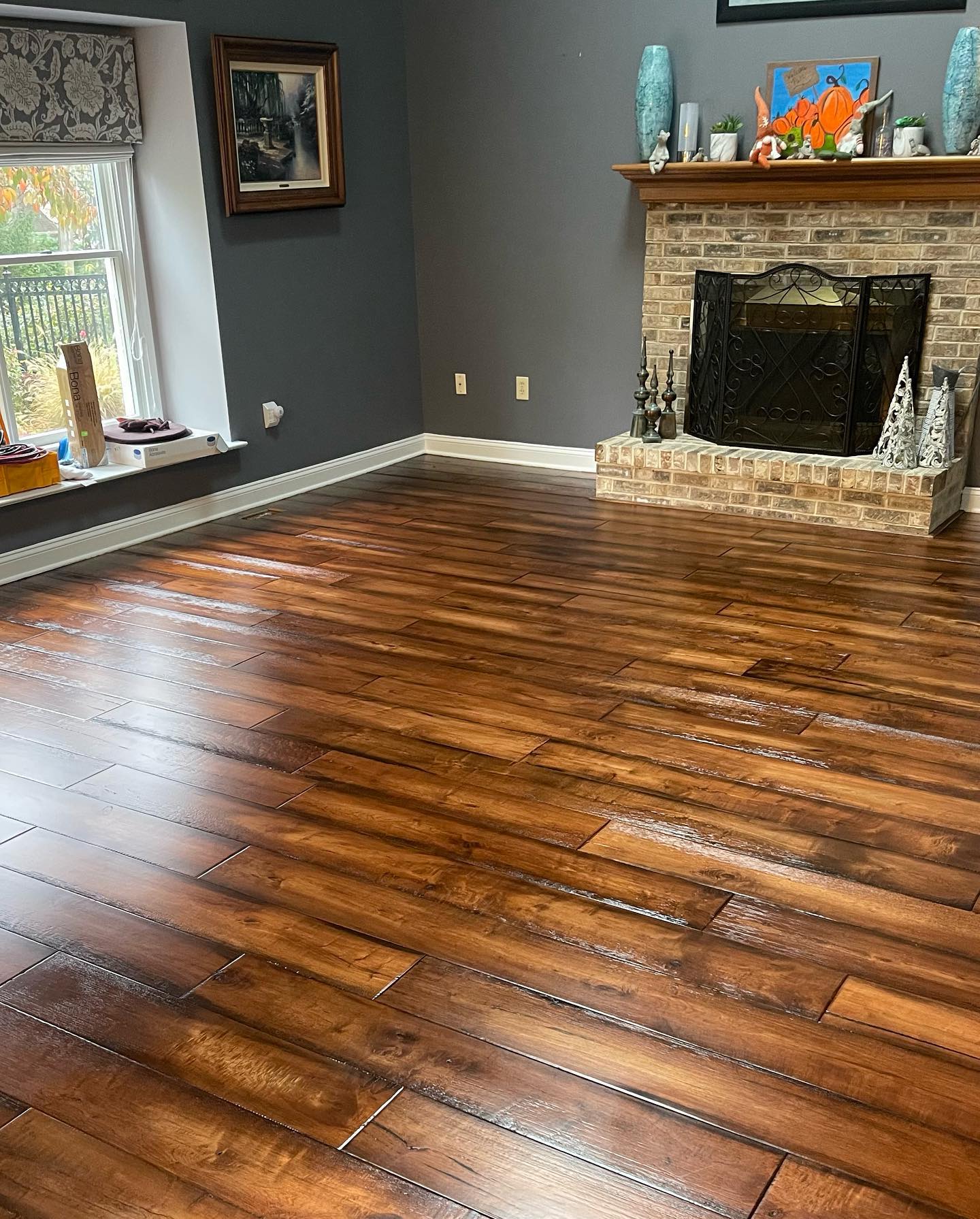 Rich hardwood floor refinishing in Delaware living room